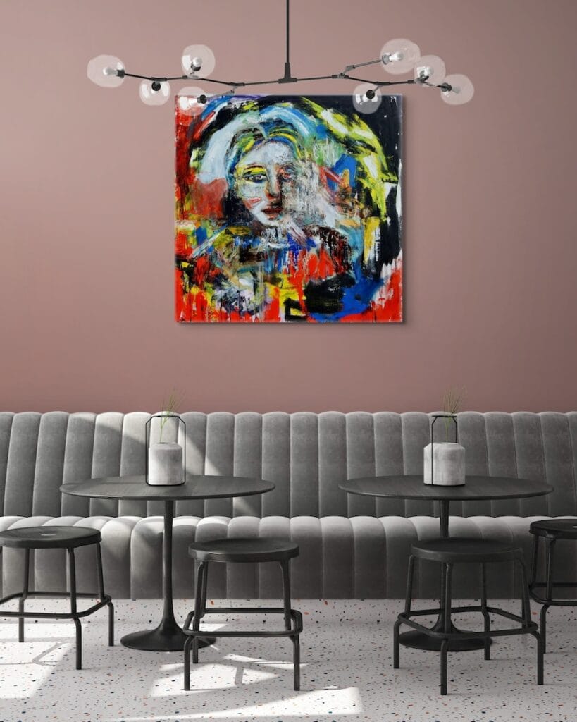 St Germain above a long cool grey couch