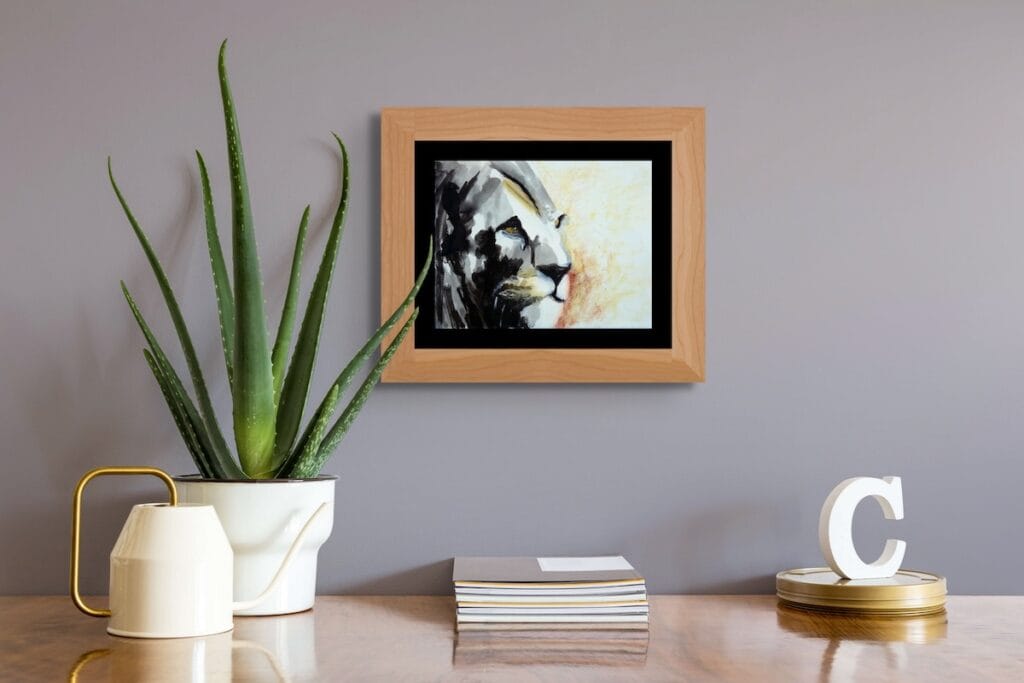 Silent Presence near a cactus on wooden desk